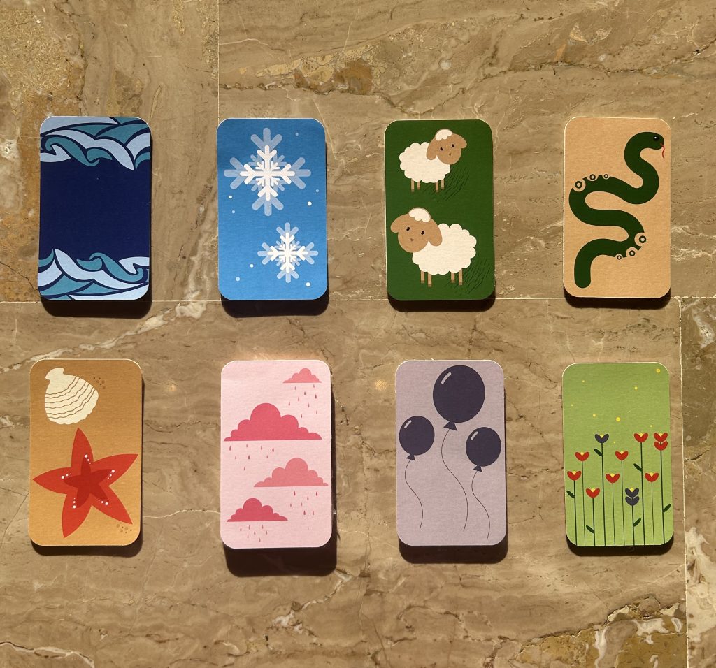 i diversi pittogrammi rappresentate sul davanti delle carte da gioco tattili sono costituite da diversi materiali